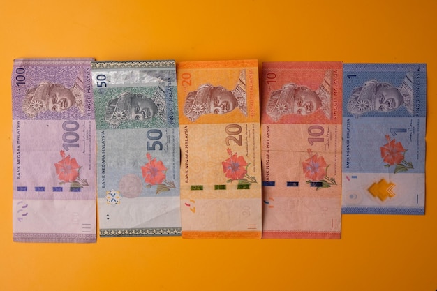 Malaysian banknotes in denominations of 100 ringgit, 50 ringgit, 20 ringgit, 10 ringgit and 1. RM.