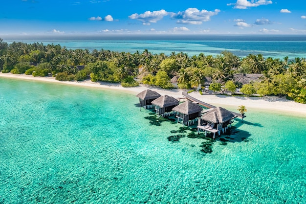 Maldives paradise scenery. Tropical aerial landscape, island seascape water villas bungalows beach