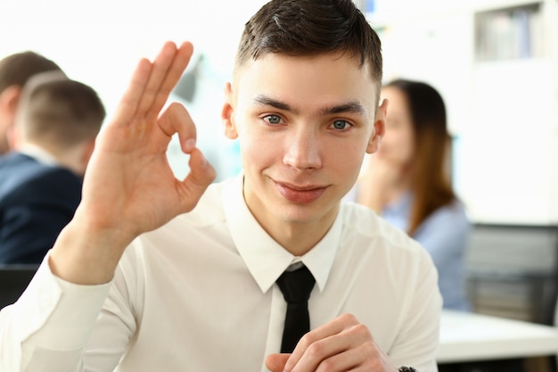 Male arm show OK or confirm during conference