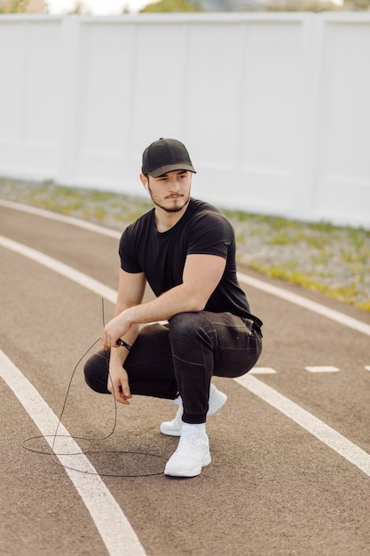 Male athlete doing fitness training. Workout outside the gym.