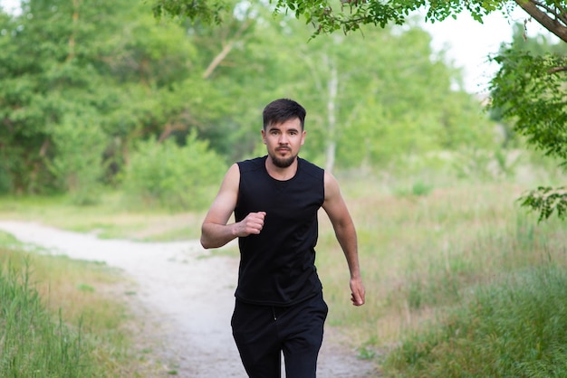 Male athlete jogging in the park