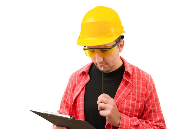 Male builder in a construction helmet with documents on a white background