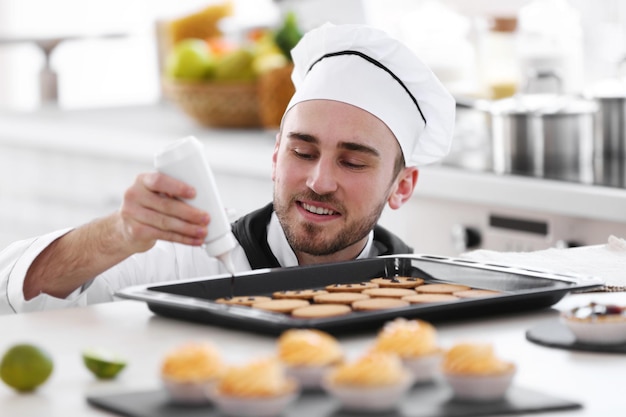 Male chef working at kitchen