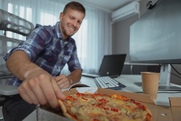 Male computer programmer working from home