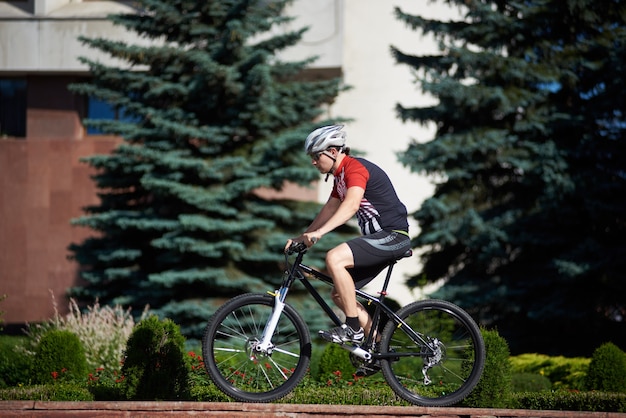 Male cyclist training on the street