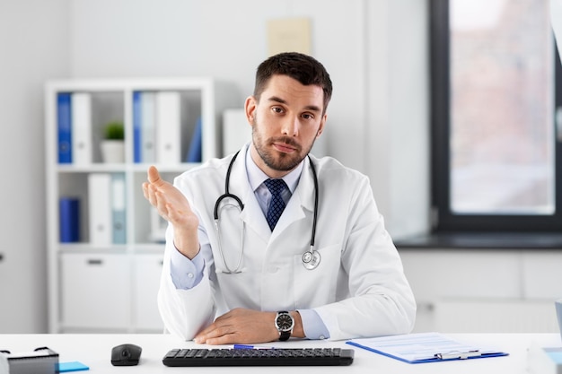 male doctor having video conference at hospital