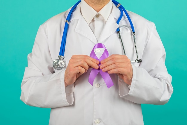 Male doctor holding a purple ribbon in her hands ADDADHDAlzheimer Disease Arnold Chiari MalformationChildhood Hemiplegia stroke Epilepsy Chronic Acute PainCrohns