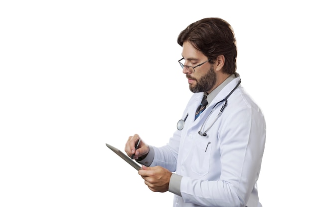 Male doctor looking at a tablet.