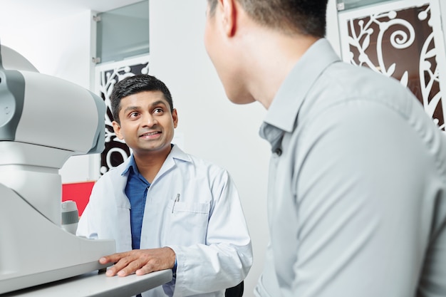 Male doctor talking to patient