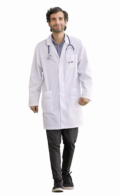 a male doctor in a white coat walks on a white background