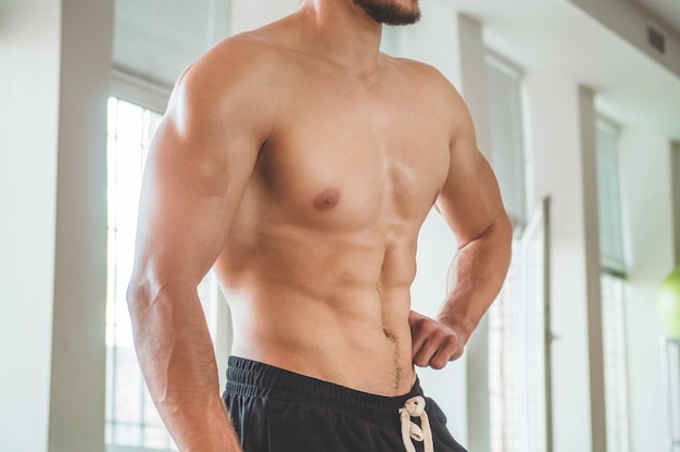 Male doing exercises in the gym