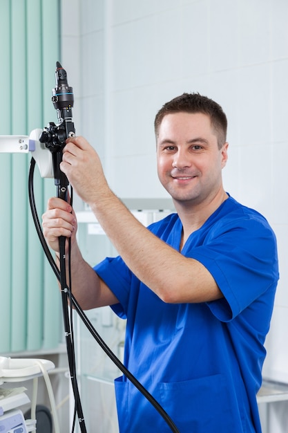 Male endoscopist is preparing to receive patients