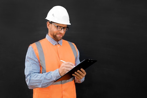 Male engineer hard hats west confident build worker blank black\
background build service copy space