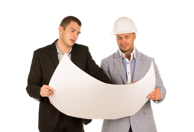 Male Engineer Showing Blueprint to Client