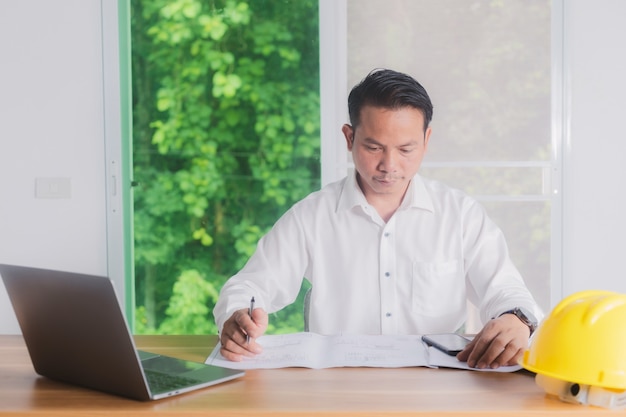 Male engineer working in office