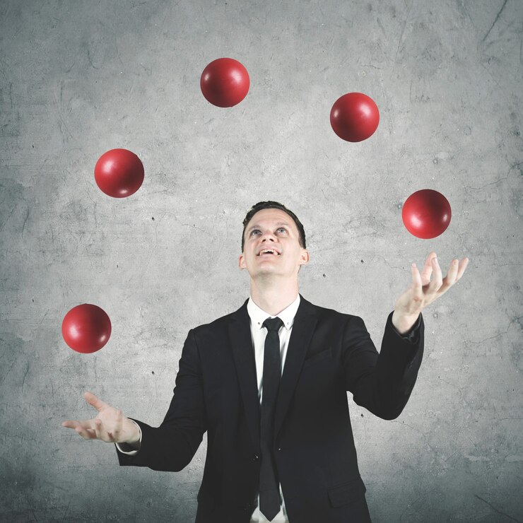 Photo male entrepreneur juggling many red balls