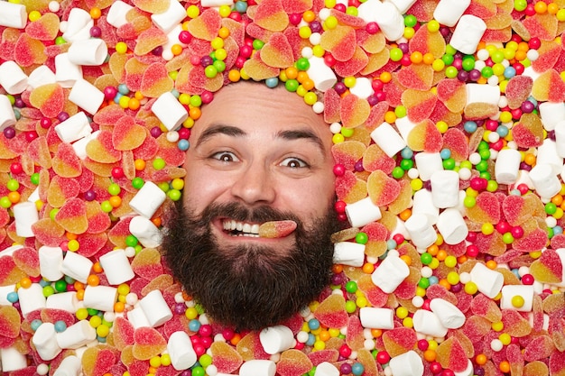 Photo male face in candies