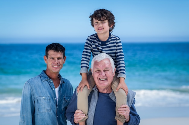 Male family members playing at the beach