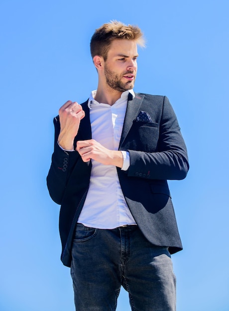 Male fashion. Formal style. Confident handsome businessman. Handsome man fashion model. Looking impeccable. Handsome guy posing in formal suit blue sky background. Office worker. Ready to work.