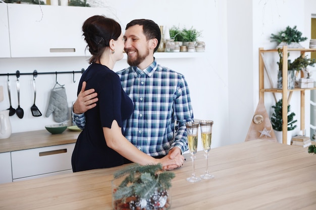 Male and female chefs working at kitchen