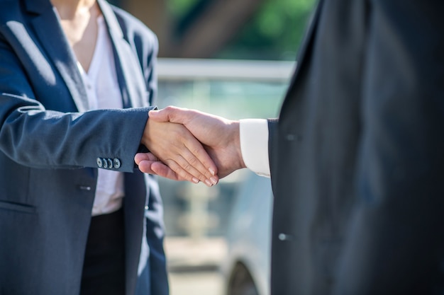 Male and female hands in a handshake