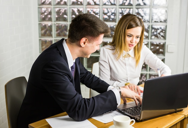 Male and female office workers.