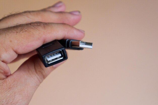 A male to female USB cable a symbol of connectivity and extension in the digital age