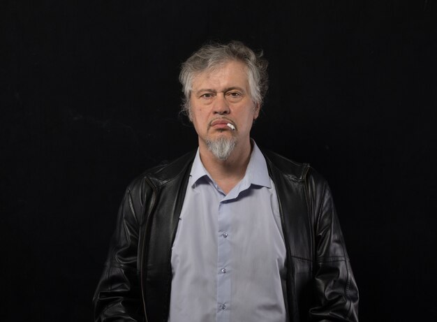 male filmmaker with a megaphone on a black background