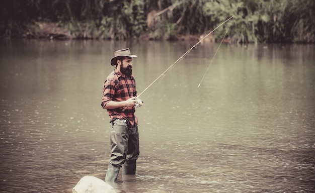 Male fishing on the lake relax in natural environment good profit carry on fishing man relaxing and