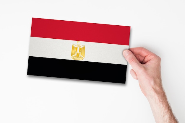 Male hand holding egypt flag