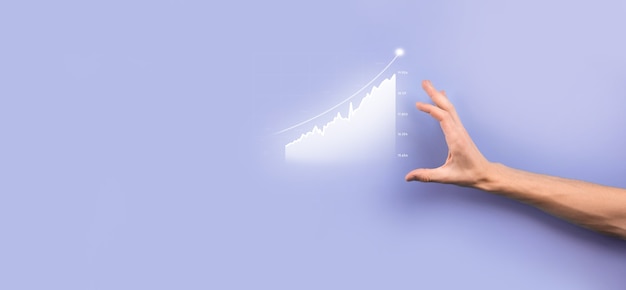 Male hand holding graph icon.checking analyzing sales data growth graph chart and stock market on global networking. Business strategy, planning and digital marketing