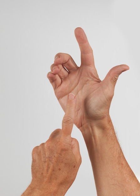 Male hand holding invisible smartphone