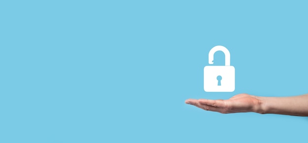 Photo male hand holding a lock padlock icon.cyber security network.