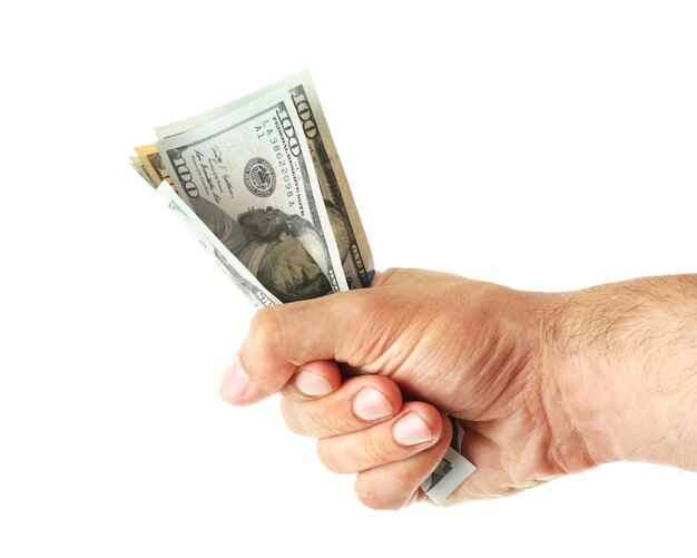 Male hand holding money isolated on white