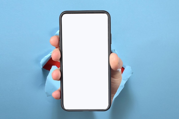 male hand holding phone with blank white screen