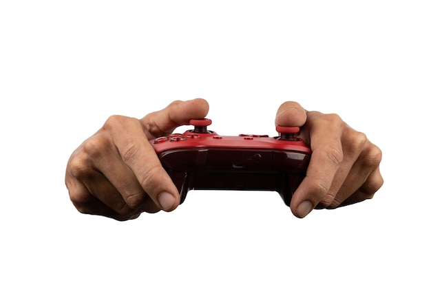 Male hand holding a red game controller isolated on white background