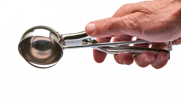 Male hand holding a Used Metal Ice Cream Scooper