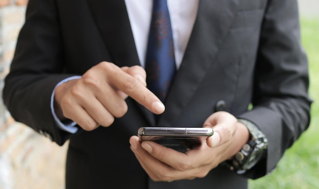 Male hand searching internet of smartphone