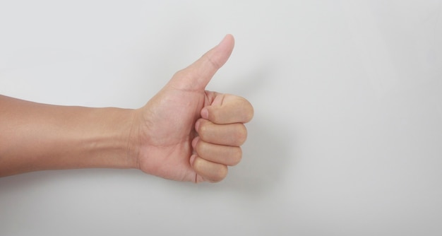 사진 에 대 한 기호를 엄지손가락을 보여주는 남성 손