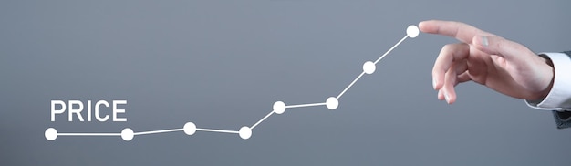 Photo male hand touching in price growth graph