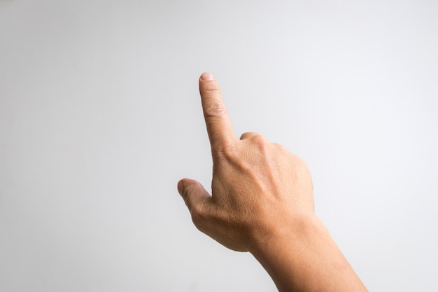 Male hand with index finger pointing to something