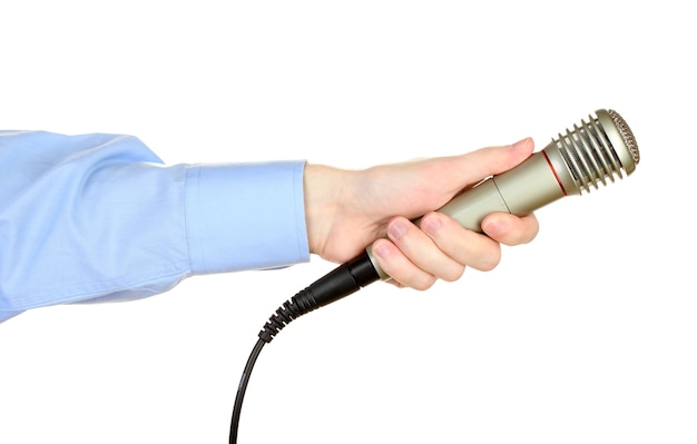 Male hand with microphone isolated on white