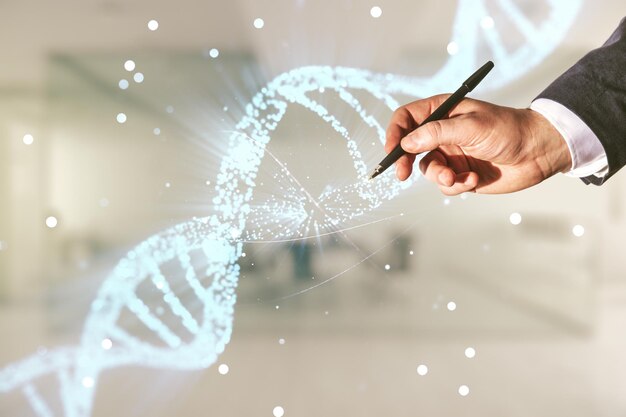 Male hand with pen working with DNA hologram on blurred interior background biotechnology and genetic concept Multiexposure