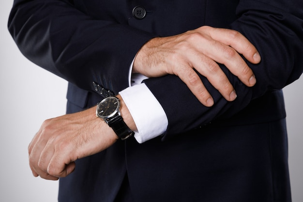 Male hand and wristwatch