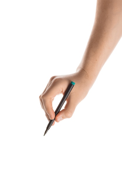 Male hand writing with the marker or felt pen. Isolated on white background.