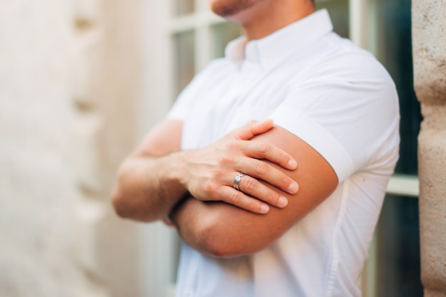 Male hands closeup hands of the groom