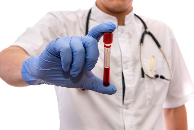 Male hands in gloves holding red test tube isolated