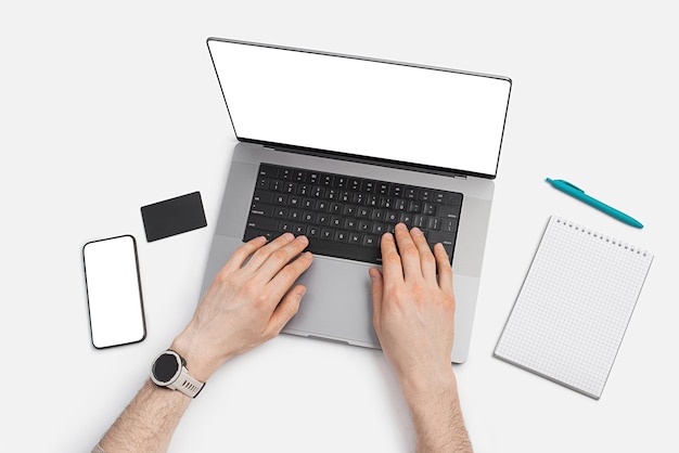 Male hands on the laptop keyboardWorkplace