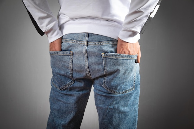 Male hands in pocket of jeans