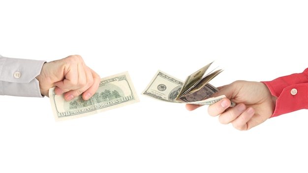 male hands with money opposite each other on a white. business relationship. salary.
